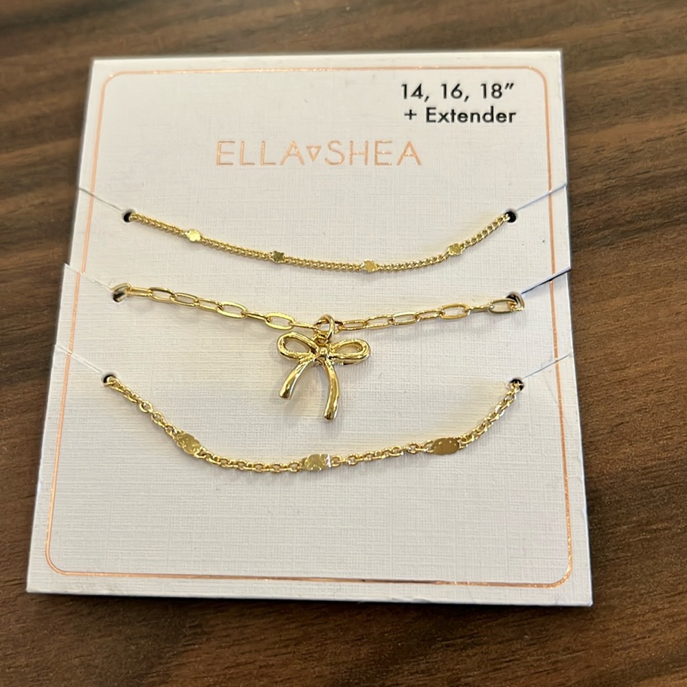 Ella Shea goldtone necklaces, new on card
